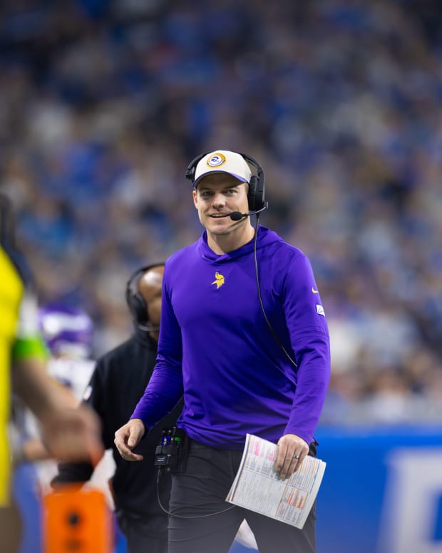 Minnesota Vikings head coach Kevin O'Connell, with wide receiver Jordan Addison in the foreground.